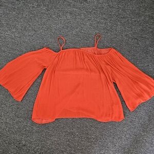 Cold shoulder silky top. Flat friendly!